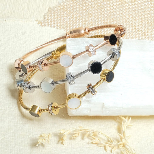 Elegant lightweight magnetic lock bangle crafted from anti-tarnish alloy with a sleek minimalist design, available in rose gold, gold, and silver, perfect for everyday styling, stacking with watches and bangles, and thoughtful gifting.