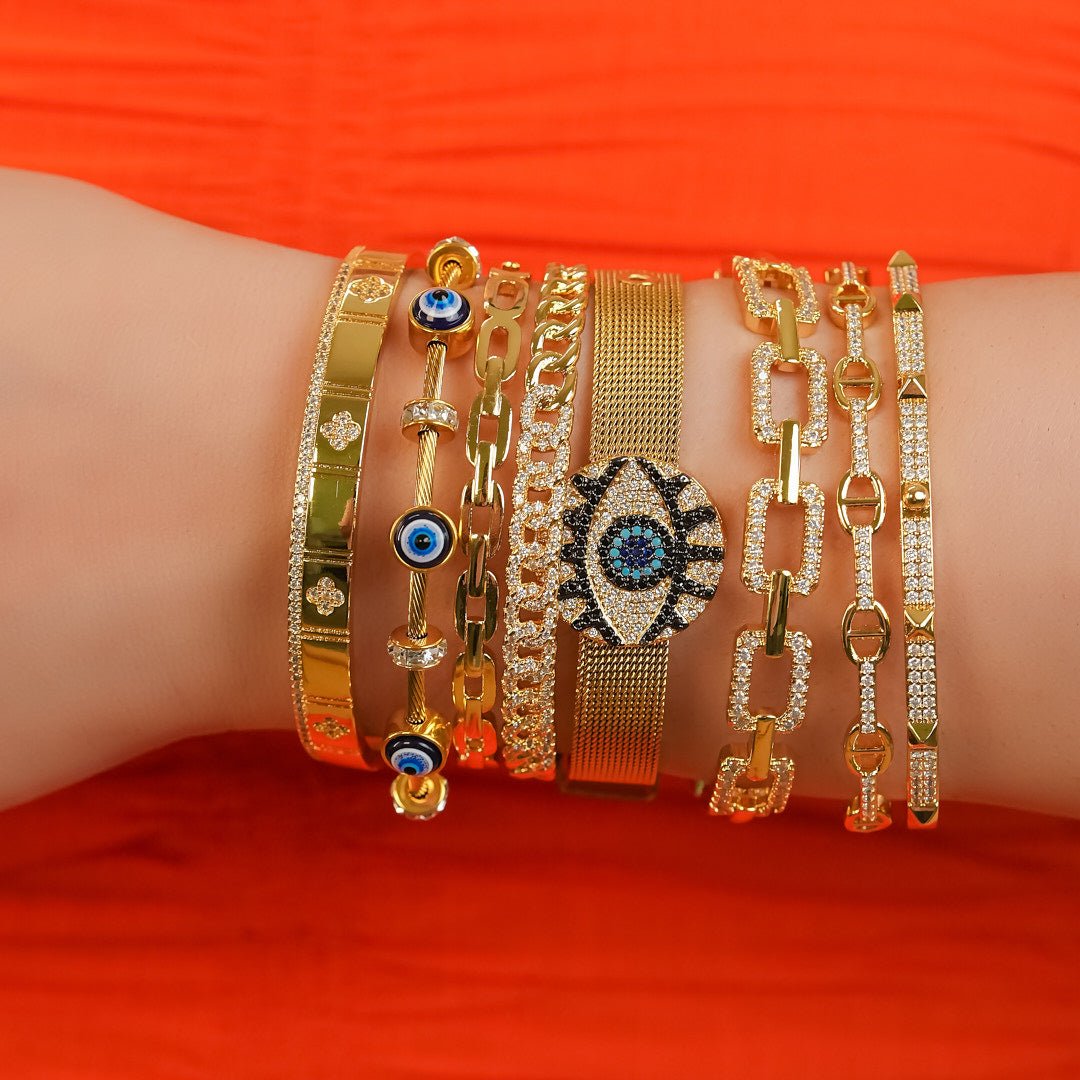 Elegant dainty Evil eye bangle with an anti-tarnish finish, available in rosegold, silver, and golden, perfect for stacking, everyday elegance, and chic versatile styling.
