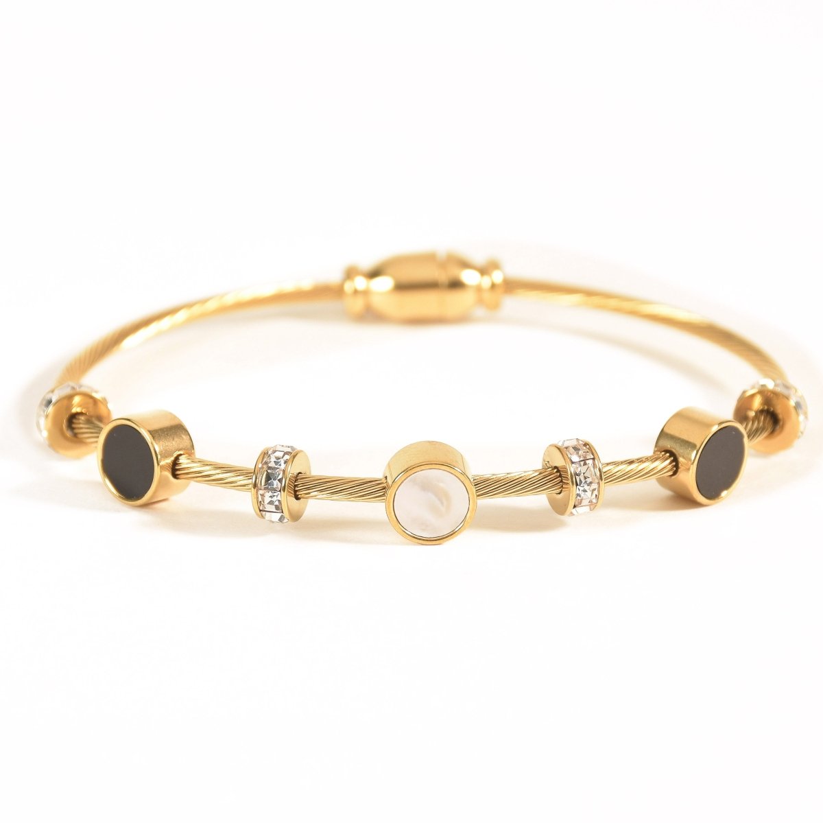 Elegant lightweight magnetic lock bangle crafted from anti-tarnish alloy with a sleek minimalist design, available in rose gold, gold, and silver, perfect for everyday styling, stacking with watches and bangles, and thoughtful gifting.
