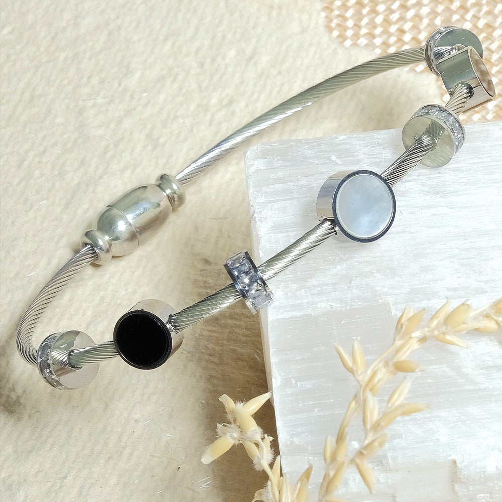 Elegant lightweight magnetic lock bangle crafted from anti-tarnish alloy with a sleek minimalist design, available in rose gold, gold, and silver, perfect for everyday styling, stacking with watches and bangles, and thoughtful gifting.
